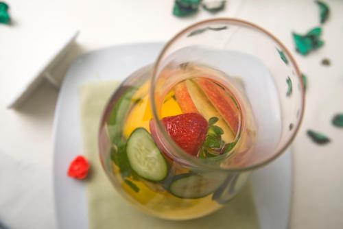 a blender filled with fruits and vegetables on a table at Hotel Villa Durrueli Resort & Spa in Ischia