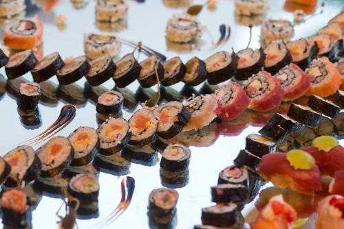 a display of desserts and pastries on a table at Hotel Villa Durrueli Resort & Spa in Ischia