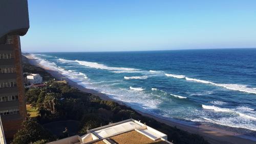 an aerial view of a beach with the ocean at 803 Bermudas - by Stay in Umhlanga in Durban