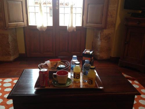 Nápoje v ubytování Apartamentos Top Medieval
