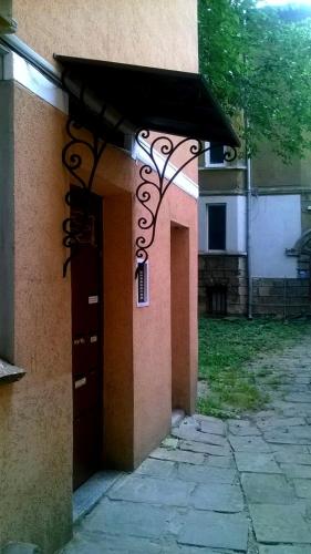 an entrance to a building with awning over a door at Architectural City Loft in Sofia