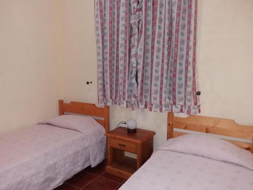 Кровать или кровати в номере Ribeira Grande Country House