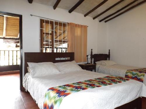Cama o camas de una habitación en La Casona Nuñez