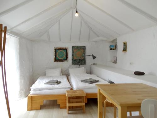 Postel nebo postele na pokoji v ubytování Finca Cosmos
