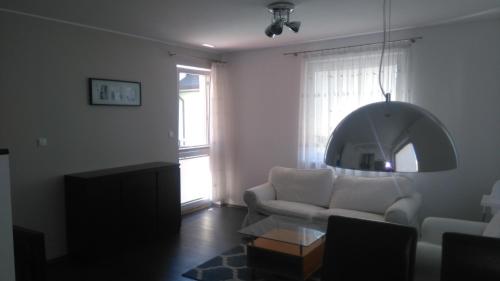Posteľ alebo postele v izbe v ubytovaní Apartament Nadmorski Jelitkowo