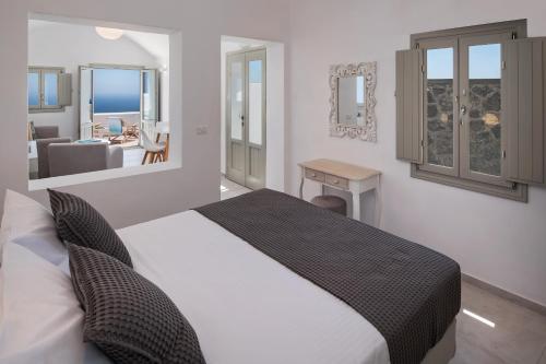 Postel nebo postele na pokoji v ubytování Altemar Suites