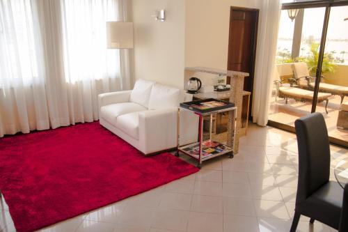 Ein Sitzbereich in der Unterkunft Hotel Continental Luanda