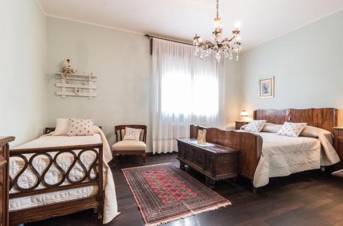 Ένα ή περισσότερα κρεβάτια σε δωμάτιο στο Casa Bibi