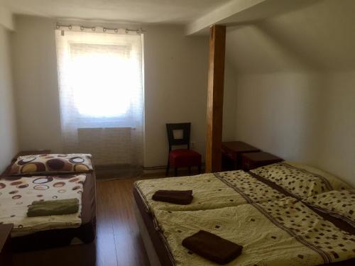 Ubytovna Statek Olomoucにあるベッド