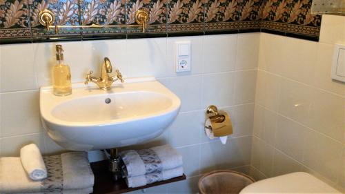 Koupelna v ubytování Héritage B&B