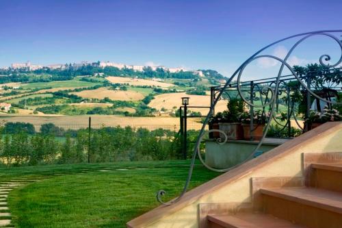 a set of stairs with a view of a hill at Relais Villa Fornari in Camerino