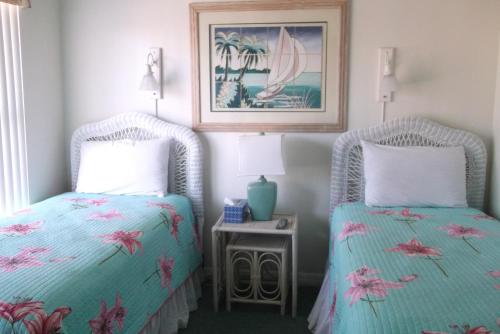 En eller flere senge i et værelse på Sunrise Resort by Liberte'