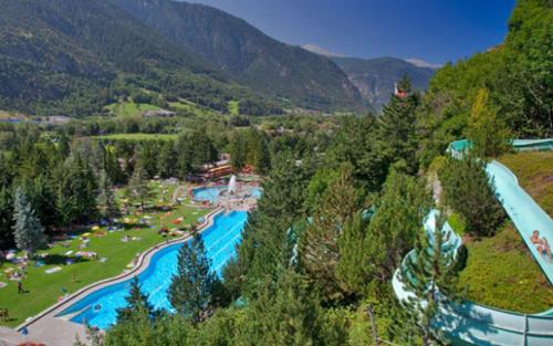 an aerial view of a water park in the mountains at Bel-Häx in Blatten bei Naters