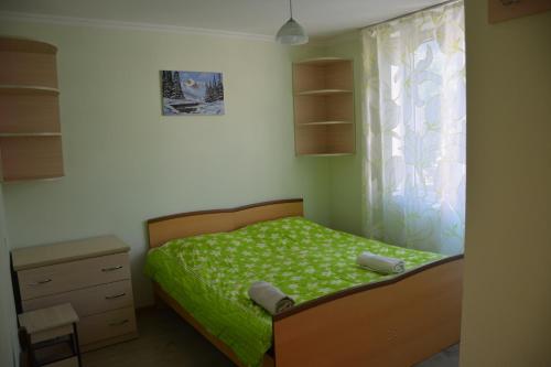 Un ou plusieurs lits dans un hébergement de l'établissement House in Mestia