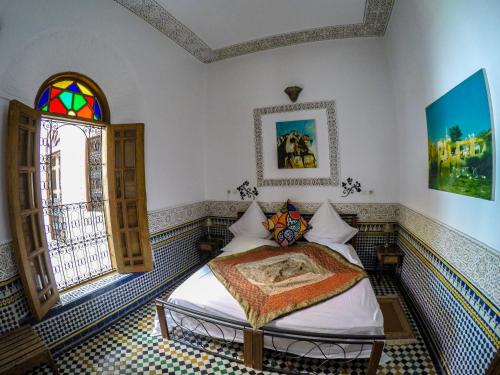 Postel nebo postele na pokoji v ubytování Riad La Clé De Fès