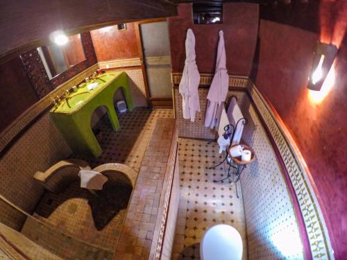 an overhead view of a bathroom with a sink at Riad La Clé De Fès in Fez