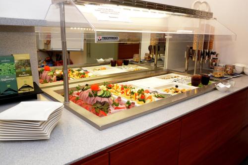 a buffet line with many different types of food at Landgasthof Buchner in Admont