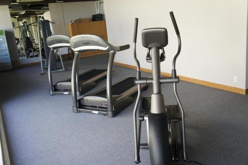 a row of exercise bikes in a gym at The Cliff Residence in Mui Ne