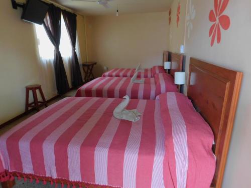Кровать или кровати в номере Hotel Florida Oaxaca
