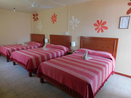 Кровать или кровати в номере Hotel Florida Oaxaca