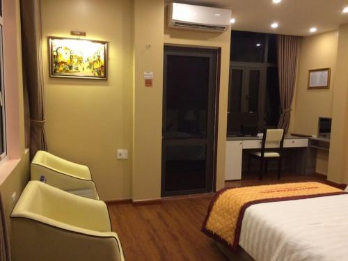 Ein Bett oder Betten in einem Zimmer der Unterkunft Hong Ky Boutique Hotel