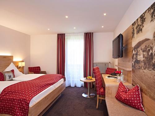 Ένα ή περισσότερα κρεβάτια σε δωμάτιο στο Landhotel Mohren