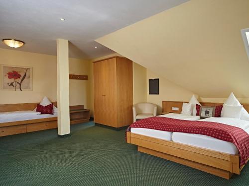 Ένα ή περισσότερα κρεβάτια σε δωμάτιο στο Landhotel Mohren