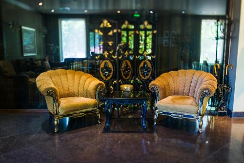 Χώρος καθιστικού στο Ventura Boutique Hotel
