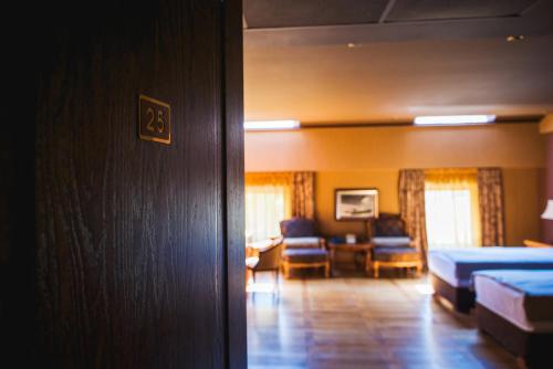 Ένα ή περισσότερα κρεβάτια σε δωμάτιο στο Ventura Boutique Hotel