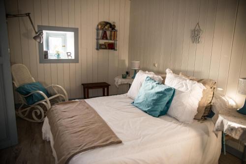 Postel nebo postele na pokoji v ubytování Casa Jacinta con jacuzzi