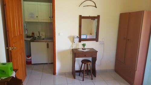 Kuchyň nebo kuchyňský kout v ubytování Galaxy Rooms