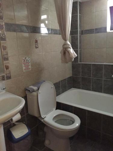 Koupelna v ubytování Eva Rooms