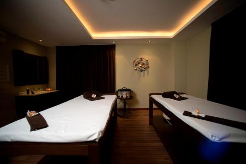 Un pat sau paturi într-o cameră la Vila Gale Alentejo Vineyard - Clube de Campo