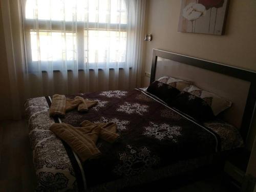Säng eller sängar i ett rum på Apartment Sveti Vlas