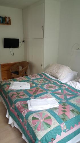 Katil atau katil-katil dalam bilik di Thorup Guesthouse