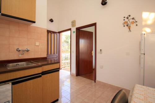 Kuchyňa alebo kuchynka v ubytovaní Apartments Lea