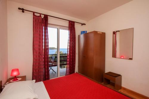 Posteľ alebo postele v izbe v ubytovaní Apartments Lea