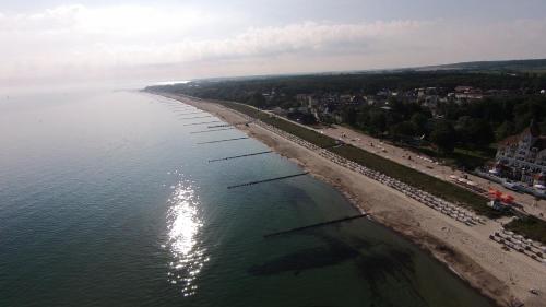 an aerial view of a beach with a group of people at Hotel Esplanade Garni in Kühlungsborn