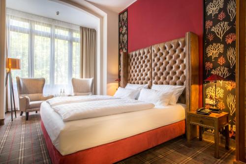Cama o camas de una habitación en The Ascot Hotel