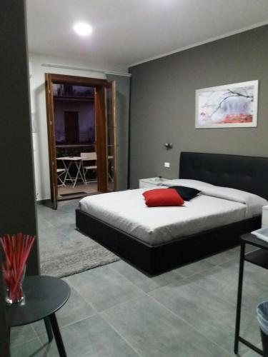 Ένα ή περισσότερα κρεβάτια σε δωμάτιο στο B&B La Grotta