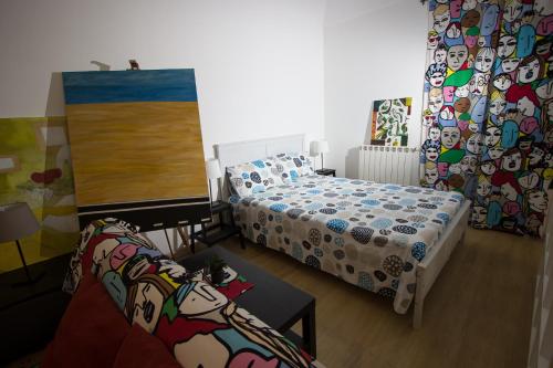 L'Atelier Dei Quattro Canti tesisinde bir odada yatak veya yataklar