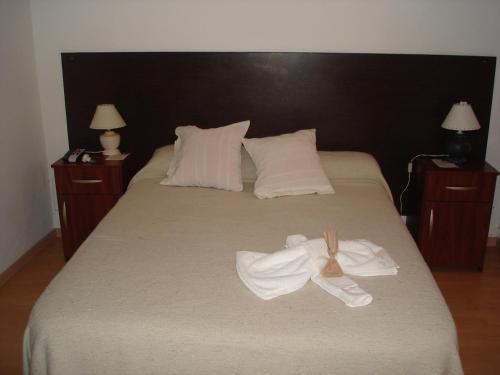 Кровать или кровати в номере Antigua Fonda Hosteria