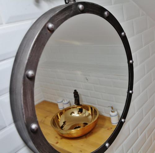Ванна кімната в Casa de oro Aparthotel