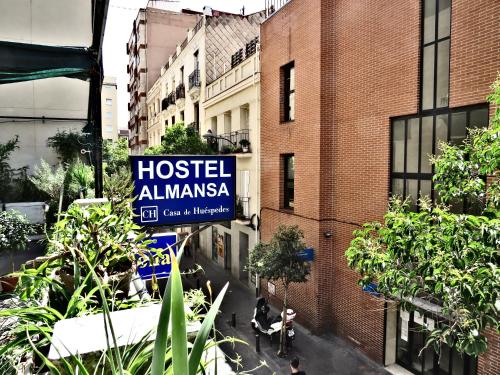 a sign that reads hostel almasa on a building at Casa de Huéspedes Almansa in Madrid