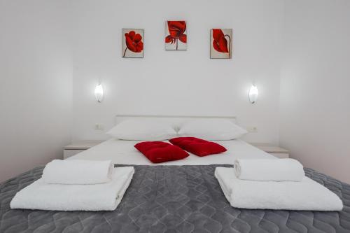 Cama ou camas em um quarto em Villa Julija