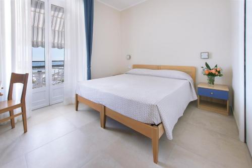 Letto o letti in una camera di Albergo Teresa