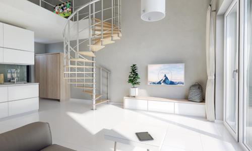 ein Wohnzimmer mit einer Wendeltreppe in einem Haus in der Unterkunft Holiday Park & Resort Niechorze in Niechorze