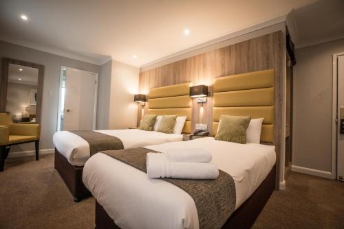 Ένα ή περισσότερα κρεβάτια σε δωμάτιο στο Steventon House Hotel