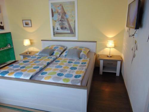 Hotel Garni "Adria"にあるベッド