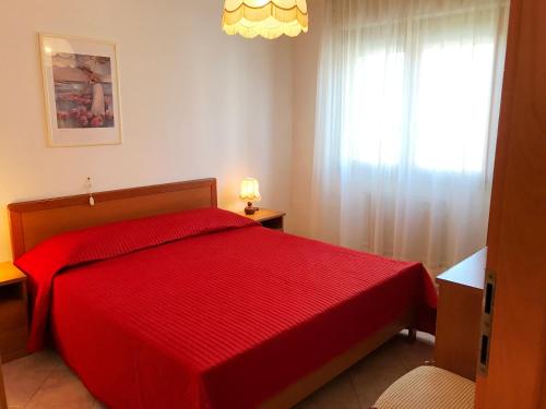 Posteľ alebo postele v izbe v ubytovaní Villa Daniela Apartment